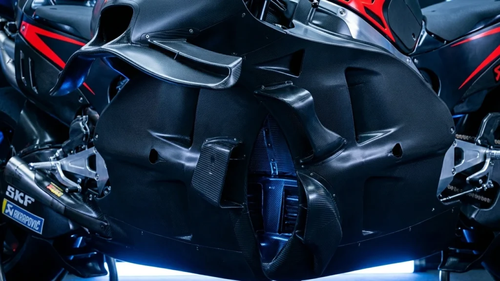 Technical close-up of the aerodynamic wings and ground effect fairings on the 2026 Ducati MotoGP bike.